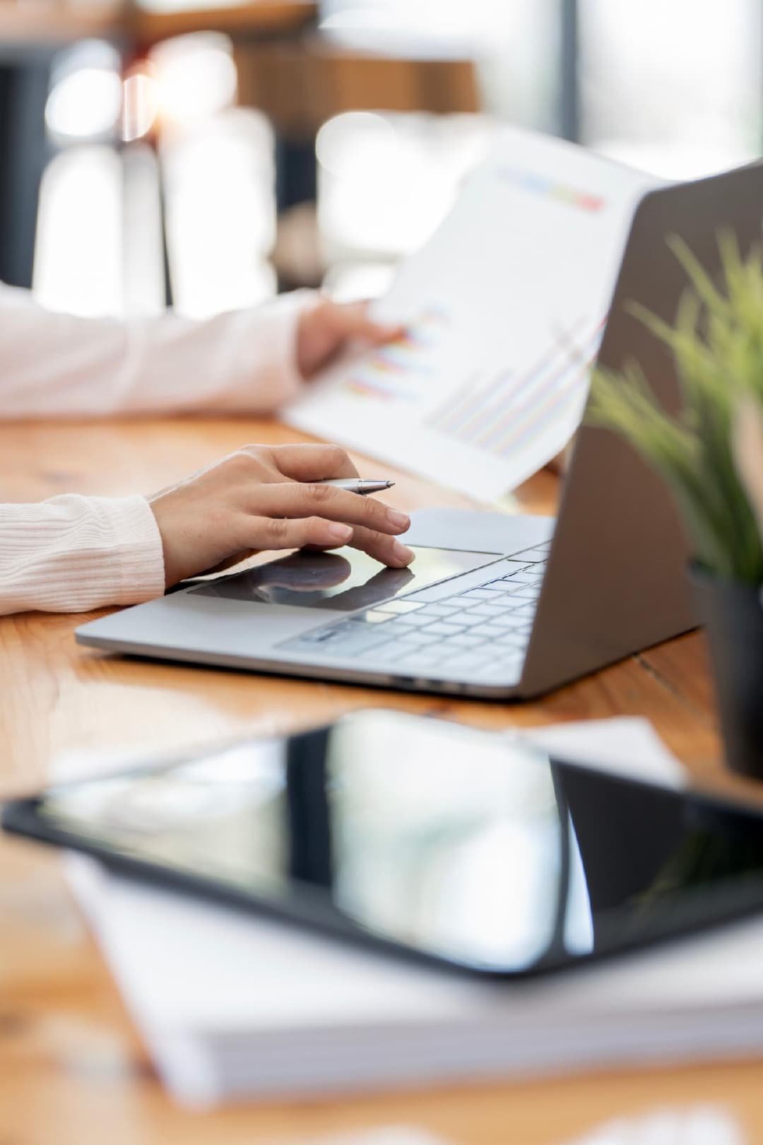 Insurance professional reviewing rate comparison data